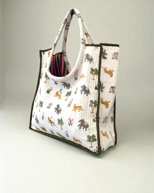 Green piped edged block print tote bag with jungle animals print from UK based Indian Poppy