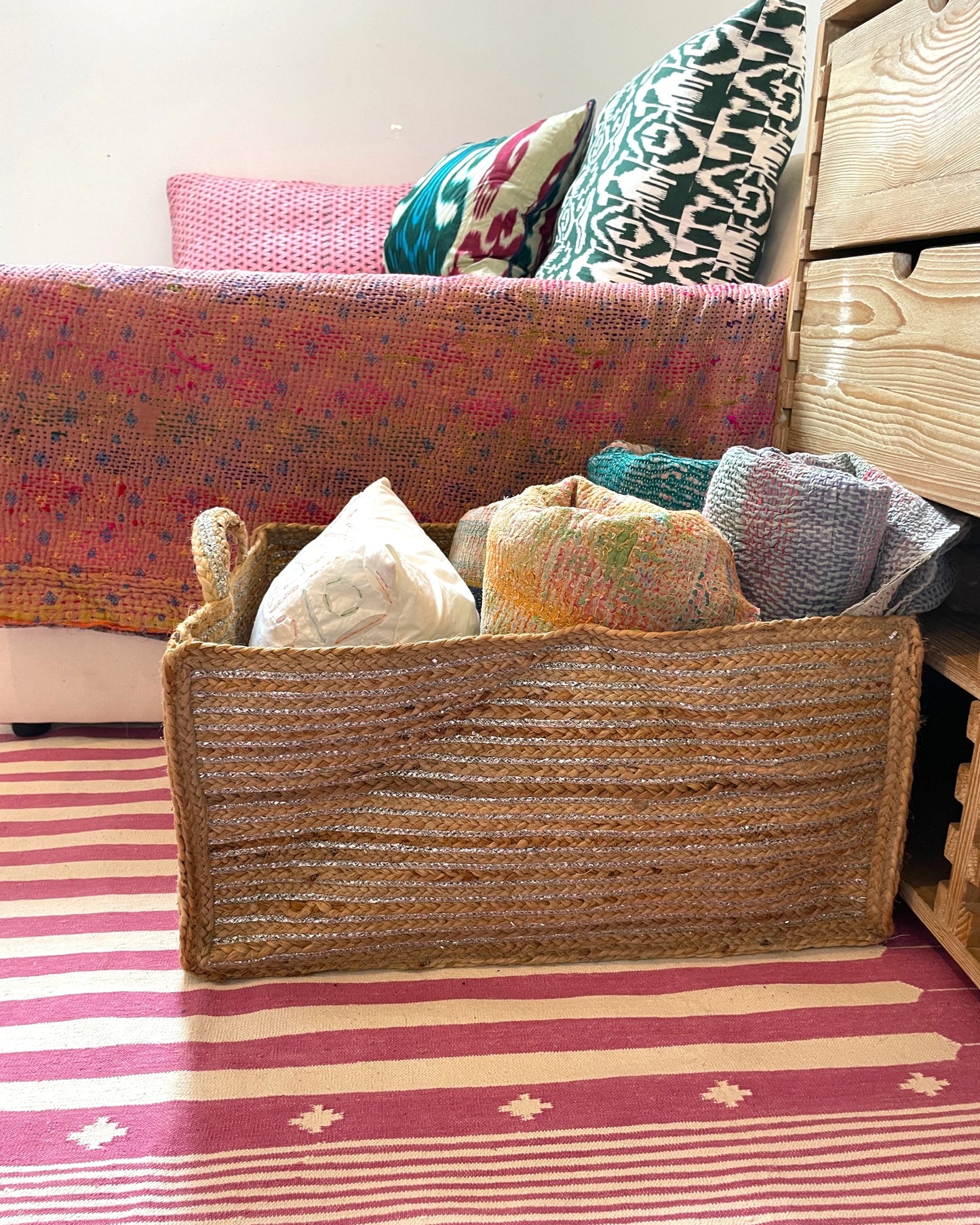 Extra large long storage baskets in a bright and colourful interior