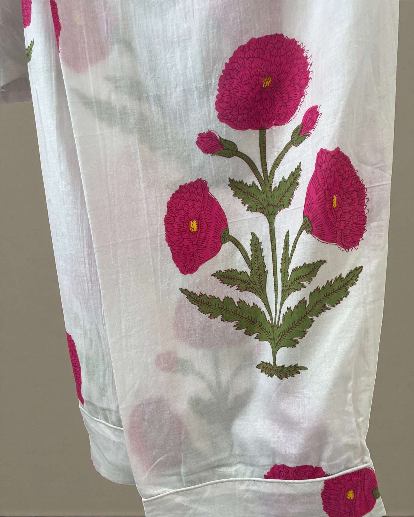 Block printed pink poppy print on cotton