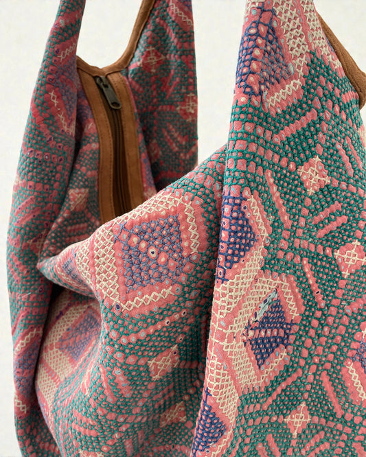 perfect gym or travel hobo style bag in an intricate, luxurious and eco friendly hand embroidered Kantha