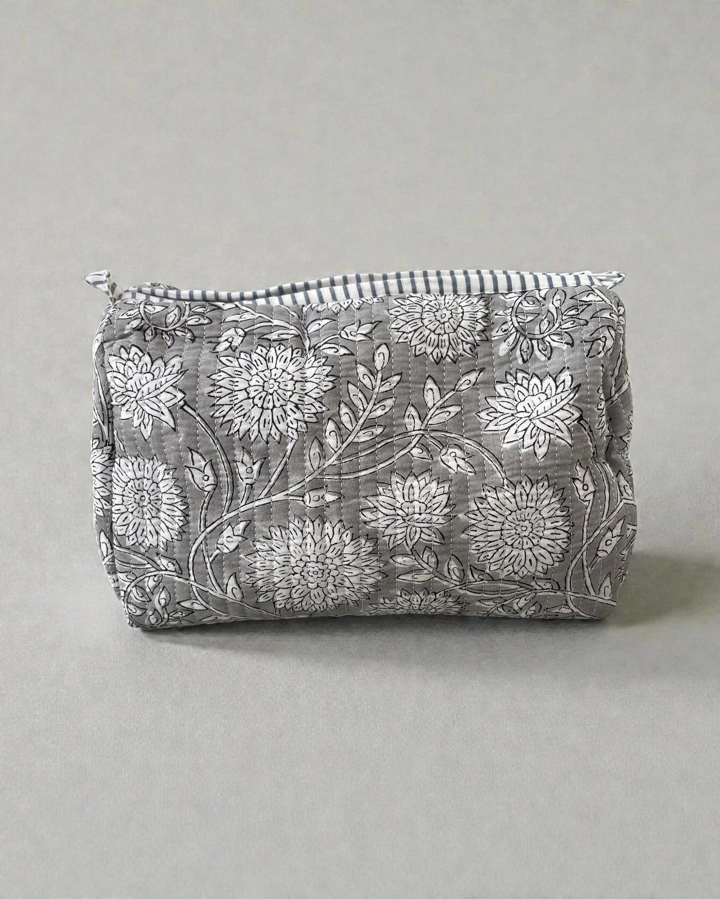 Grey floral cotton wash bags with waterproof lining in coordinated set of three