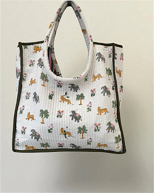 Reusable shopping tote bag with animal pattern on a plain background
