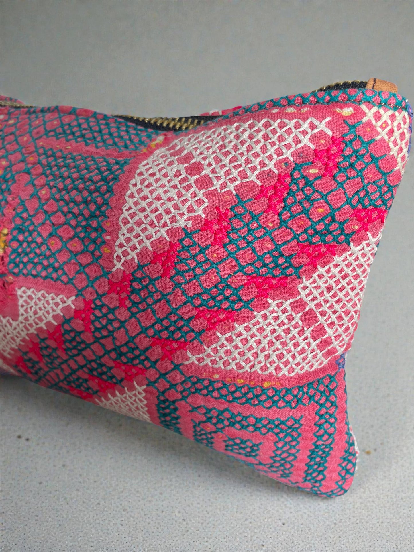 Colorful embroidered fabric travel pouch with zipper for cosmetics and toiletries