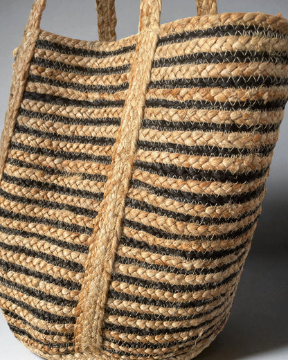 close up detail of braided black and natural striped bag