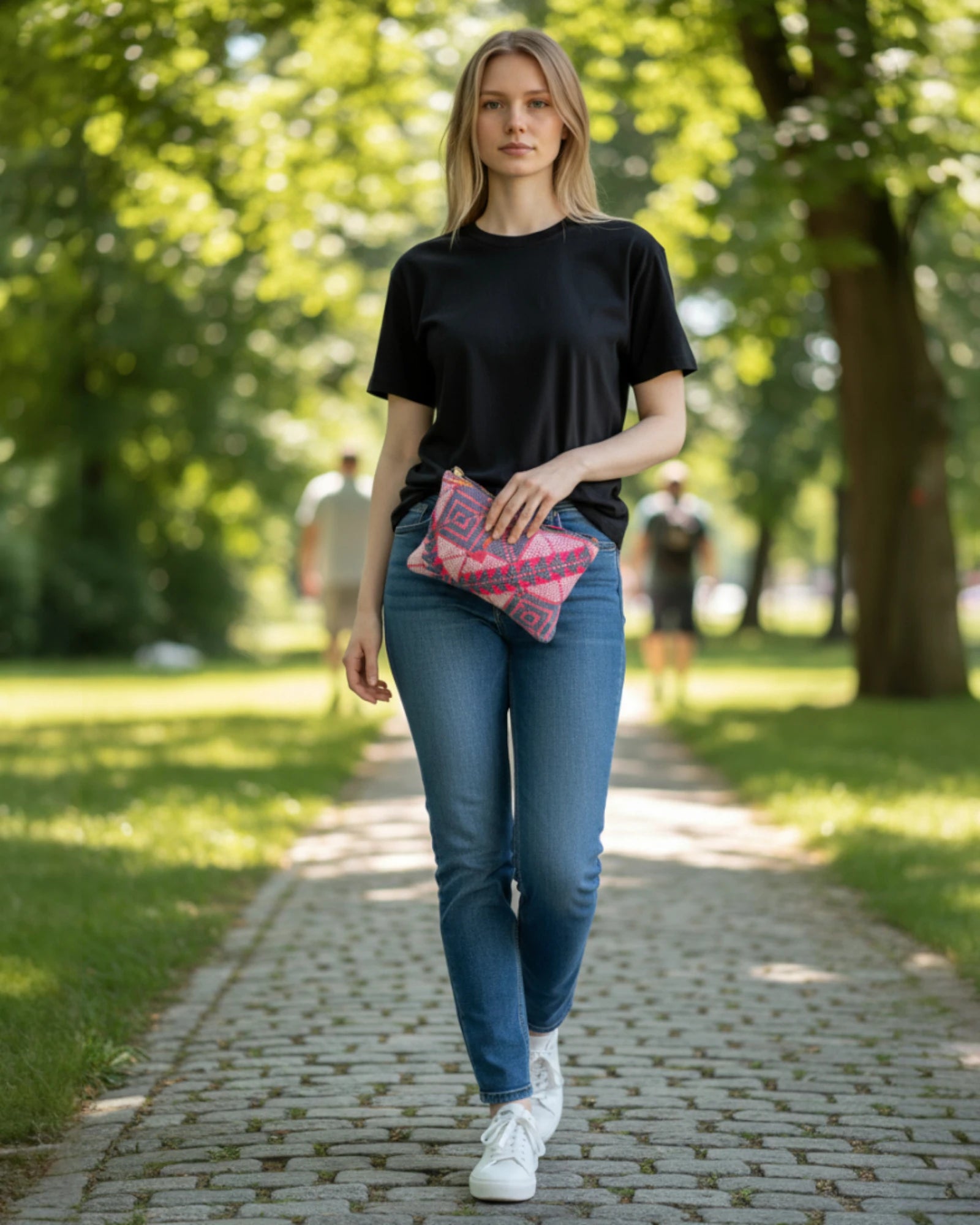 Handcrafted fabric purse with vibrant geometric design for accessories or travel essentials