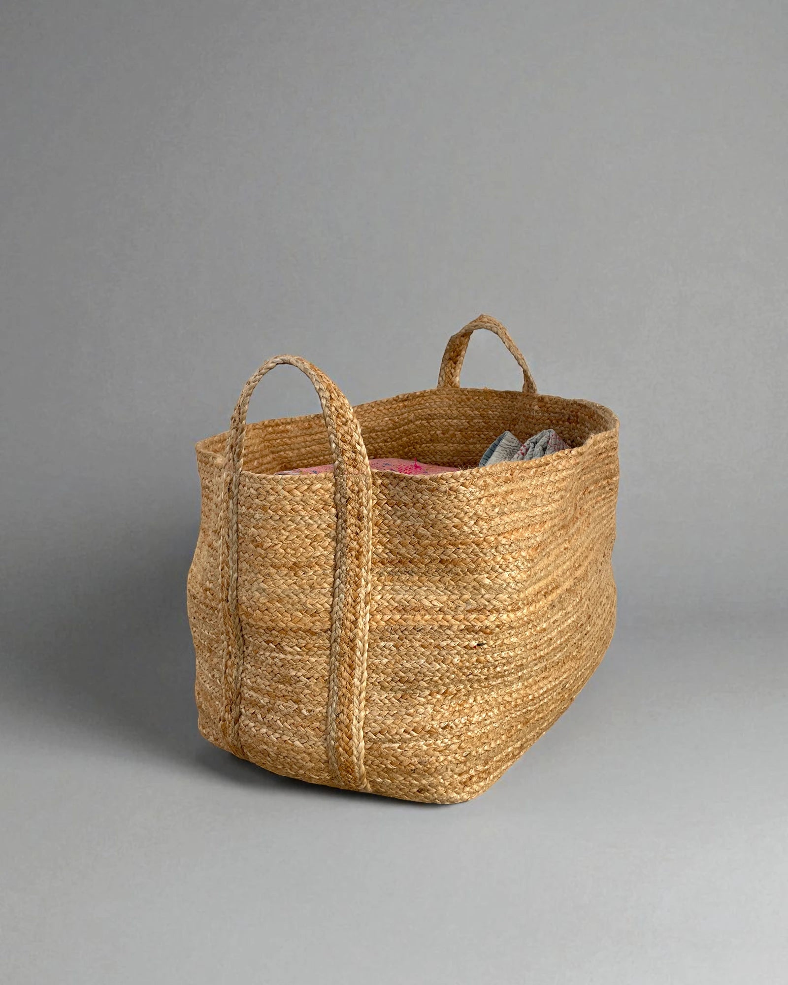 extra large storage basket made from braided, woven jute with a huge storage capacity