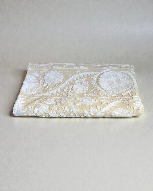 Folded hand stitched embroidered Suzani quilt folded 