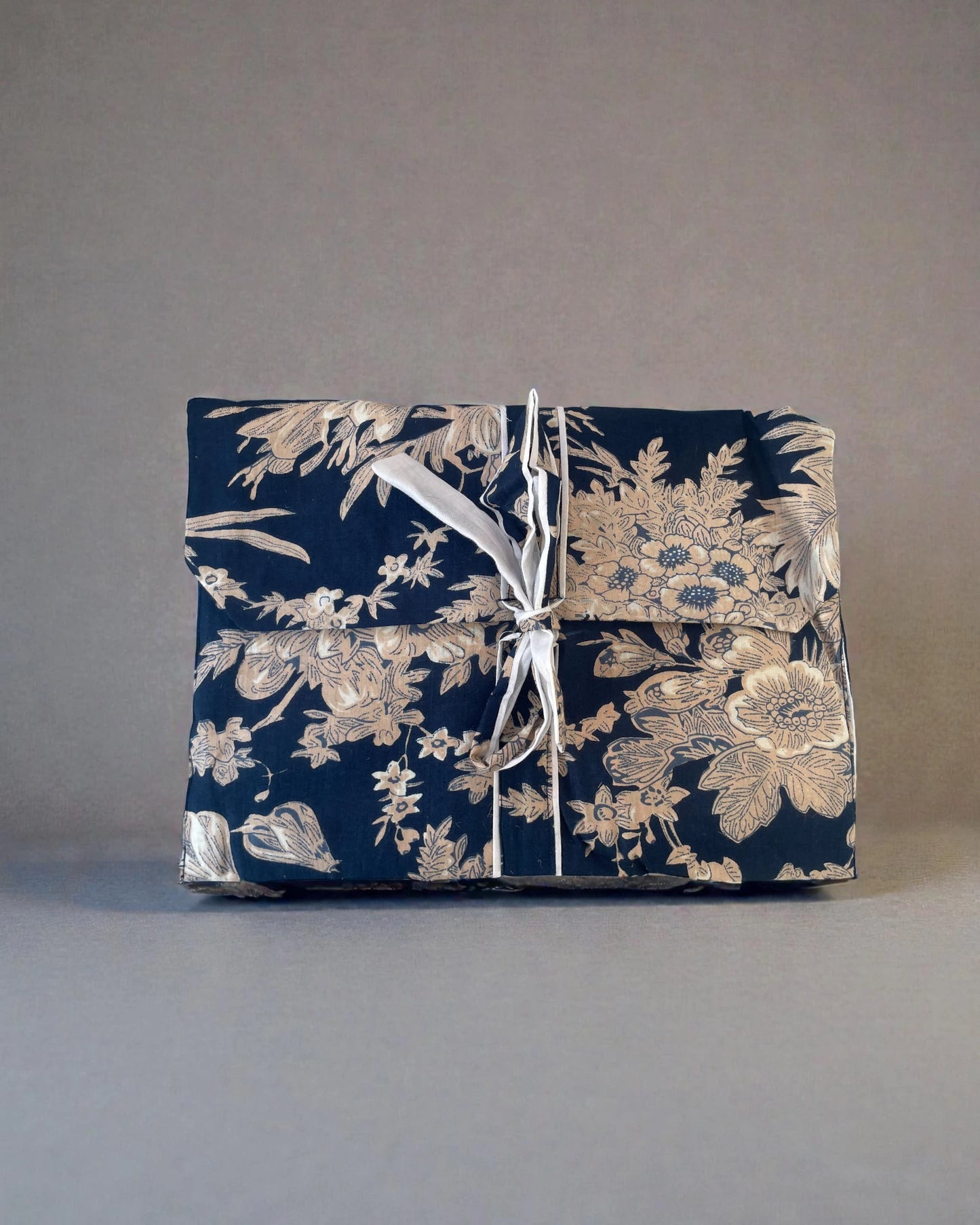 Blue floral screen printed pyjamas in their gift bag