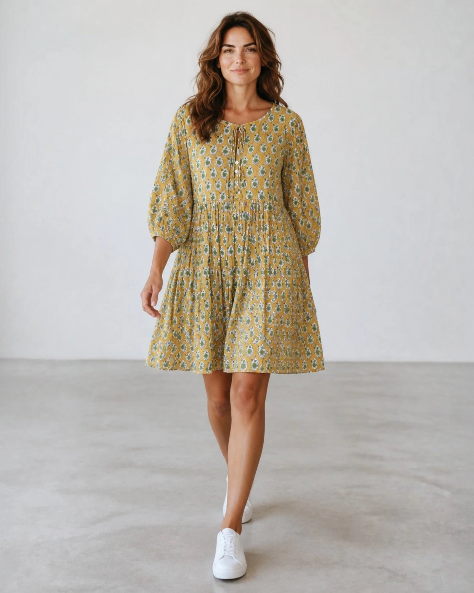 Mustard gold and olive green hand block print cotton mini dress with gathered empire waist and puff sleeves