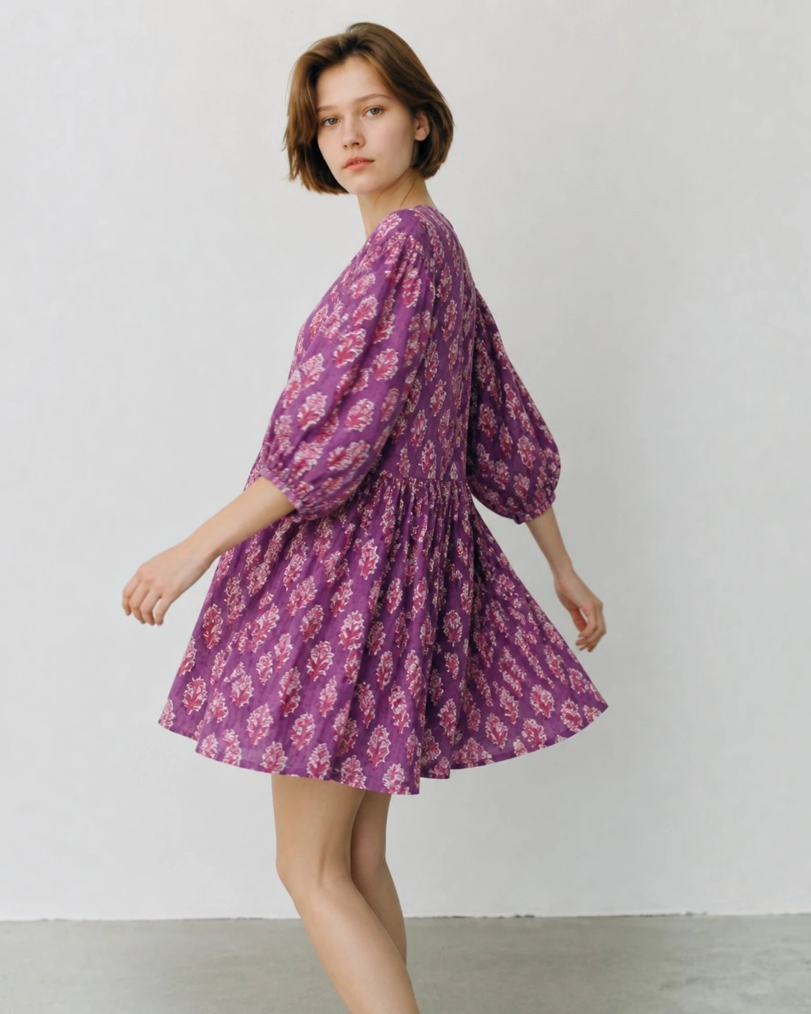 Traditional hand block printed cotton fabric in the Amethyst mini dress showing the floral motif
