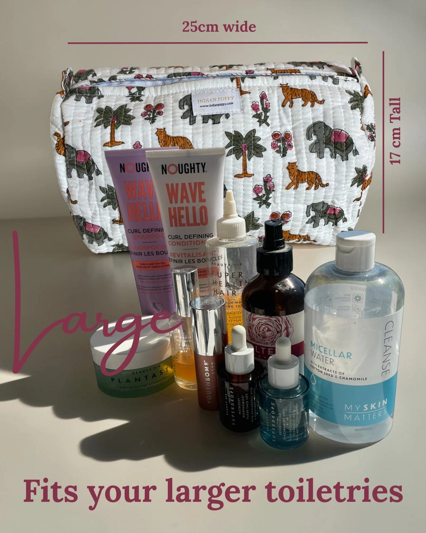 Large wash bag with spacious capacity for full-size toiletries, stylish toiletry and cosmetics pouch with overlay text stating fits your large toiletries