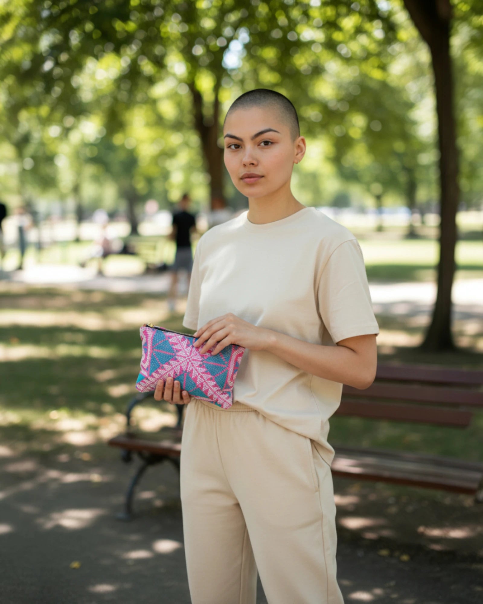 life model holding kantha travel pouch