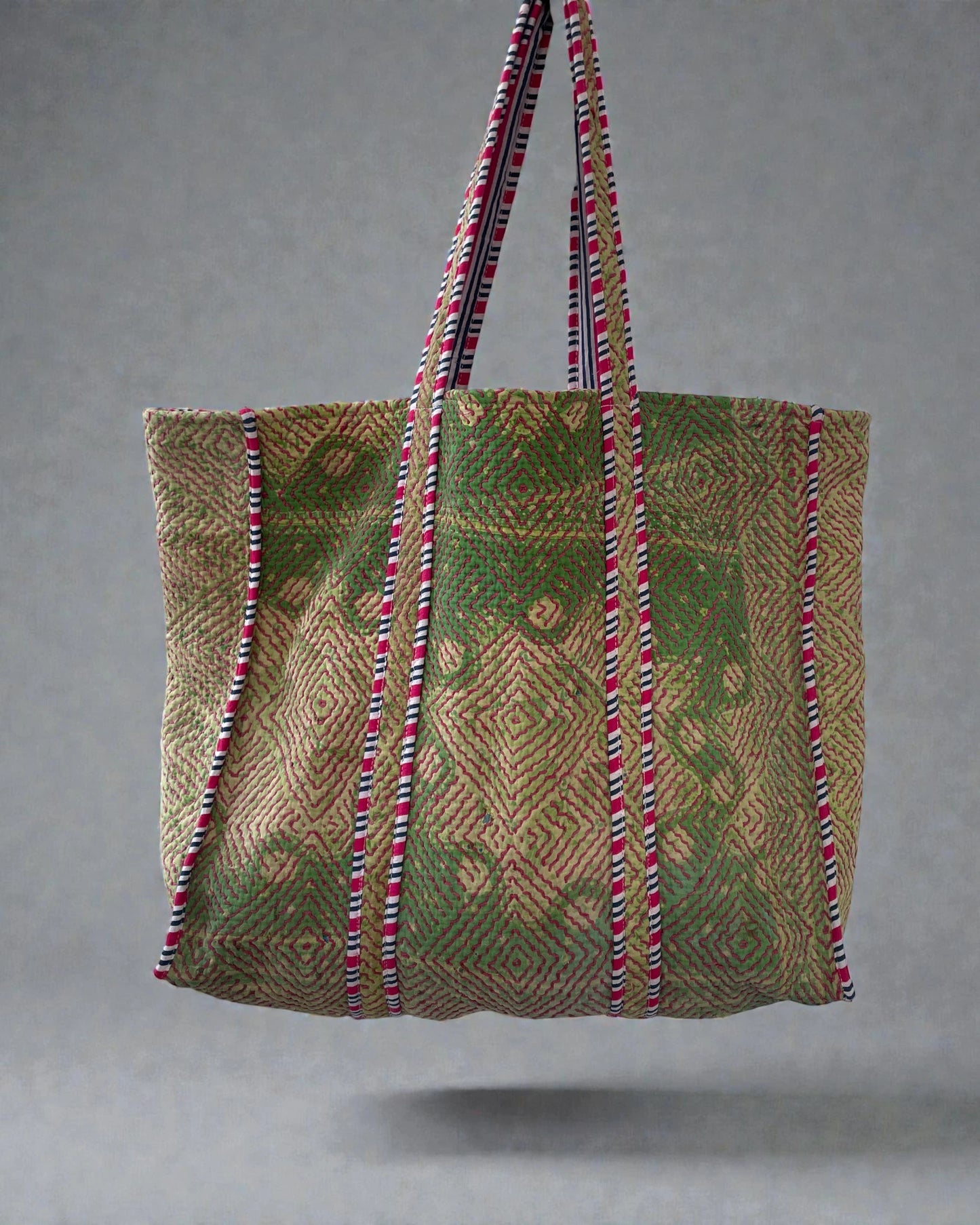 Lightweight everyday fabric bag with bold stitched diamond motifs