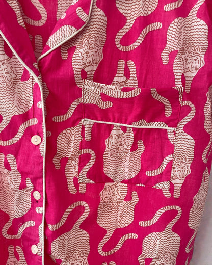 medium women’s short pyjama set in pink with contrast piping and matching gift bag