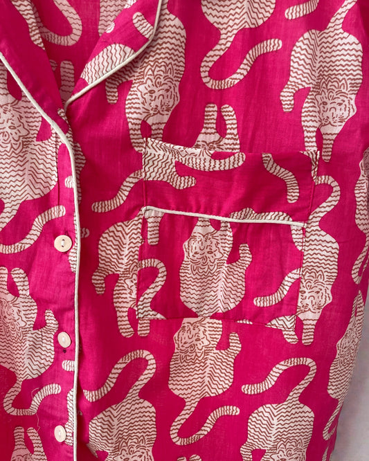 medium women’s short pyjama set in pink with contrast piping and matching gift bag