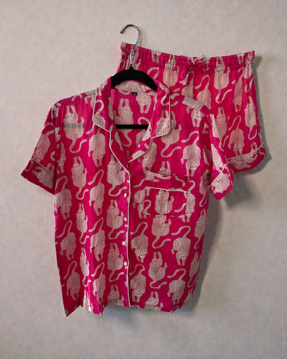women’s medium pyjama short set in bright pink with white animal print and matching gift bag