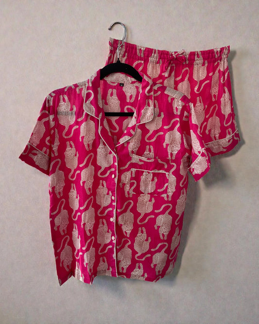 women’s medium pyjama short set in bright pink with white animal print and matching gift bag