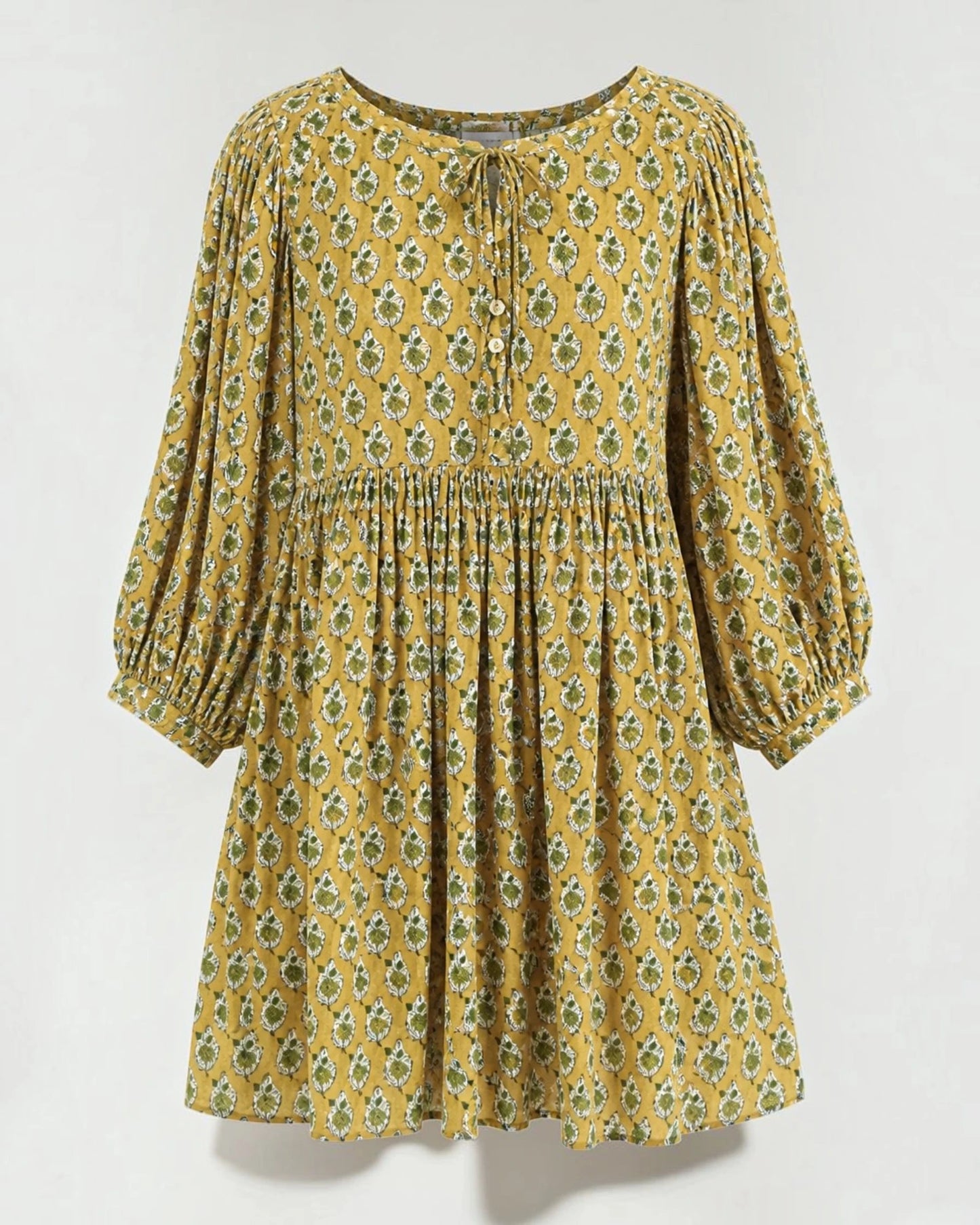 Tie neckline with mother of pearl buttons on the Marigold hand block print cotton dress