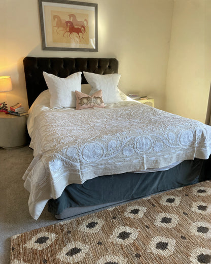 Bagheera jute runner rug styled in a neutral interior adding subtle animal print texture