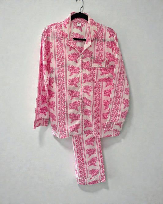 Pink floral cotton pyjama set with striped border, long sleeve button shirt and matching trousers