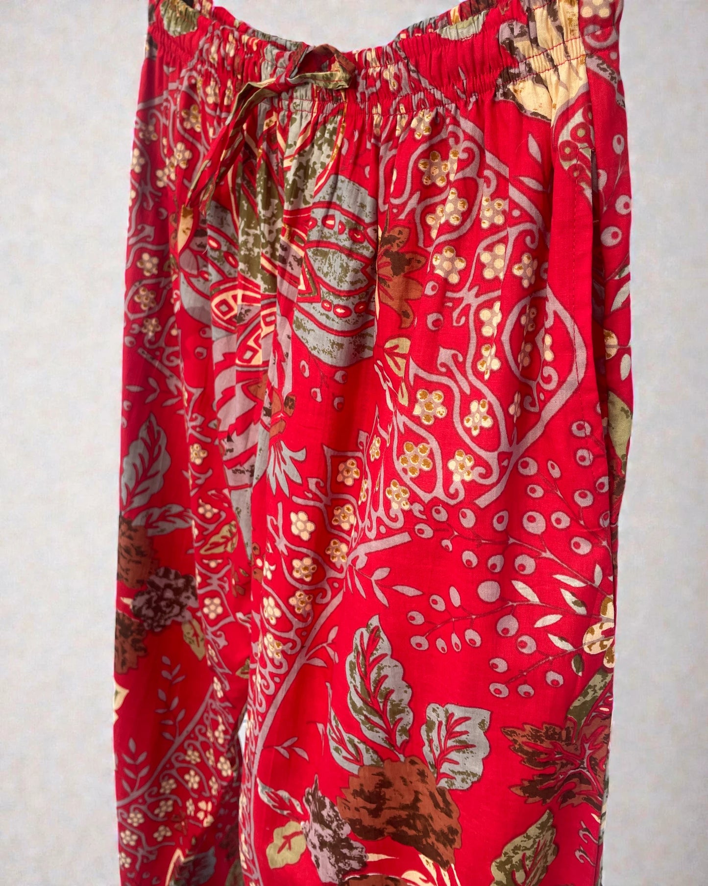 Scarlet red cotton pyjama trousers with elasticated drawstring waist and side pockets