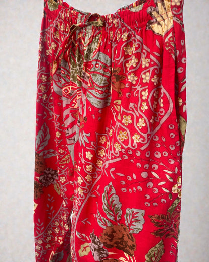 Scarlet red cotton pyjama trousers with elasticated drawstring waist and side pockets