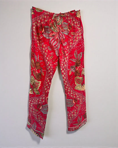 Red floral cotton pyjamas featuring a button front shirt and drawstring trousers