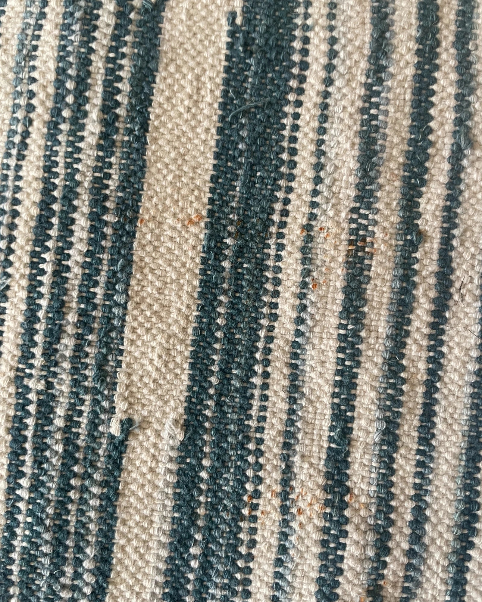 detail of imperfection on rug