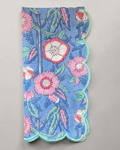 Set of six blue floral napkins with scalloped edges and contrasting teal trim for dining and entertaining