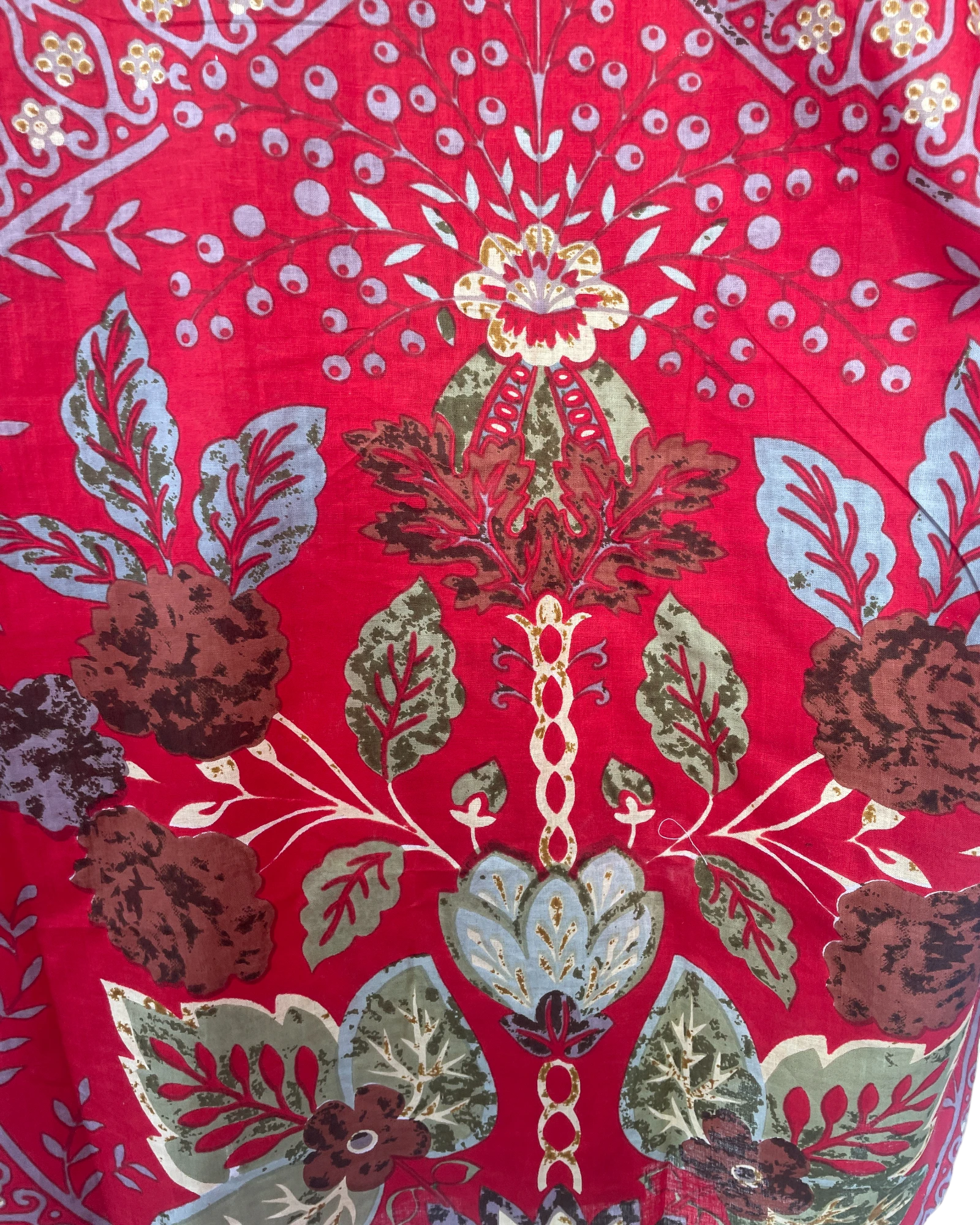 Close up of scarlet red floral print on soft breathable cotton pyjamas