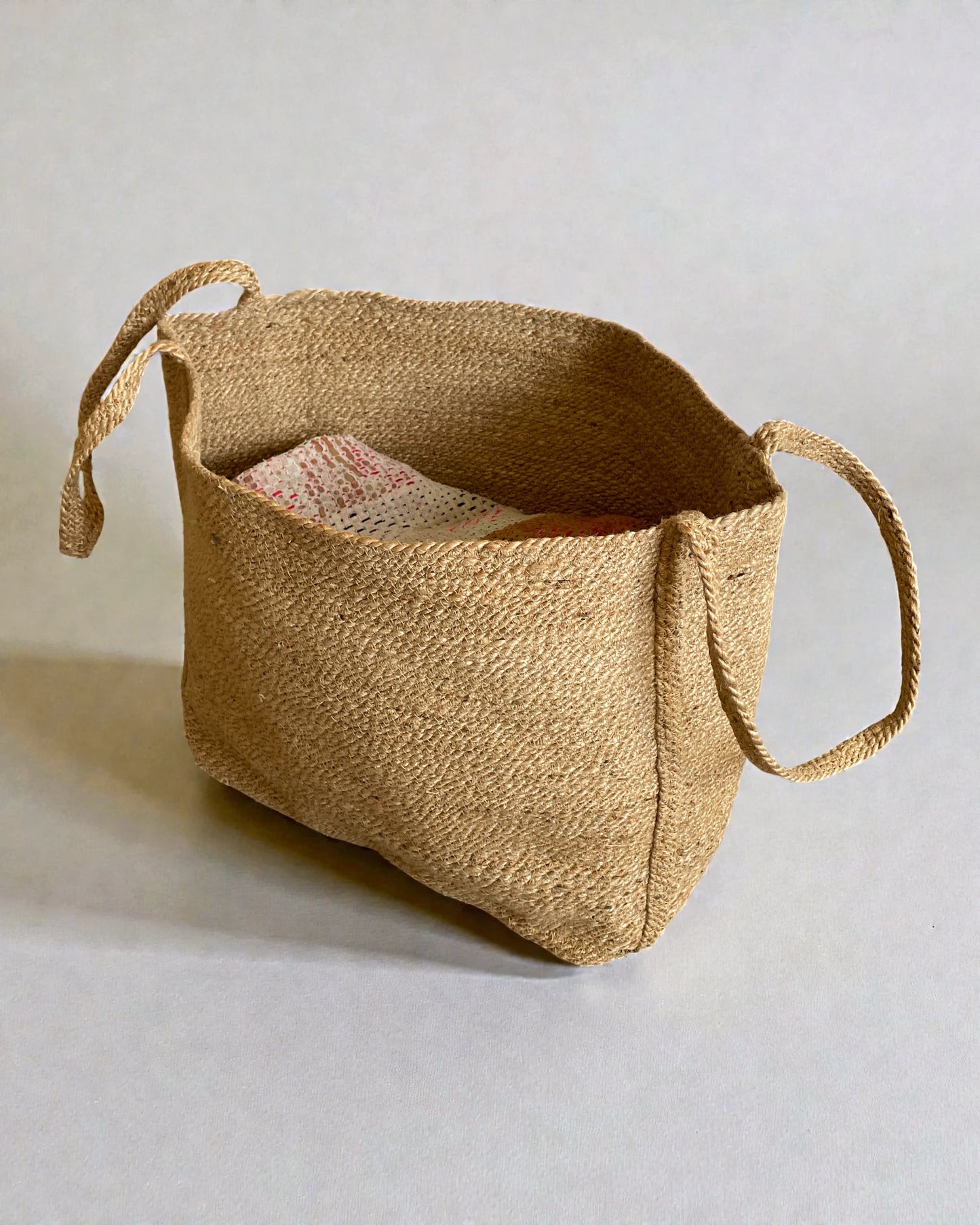 Natural handwoven sisal blanket basket with soft structured sides for home storage