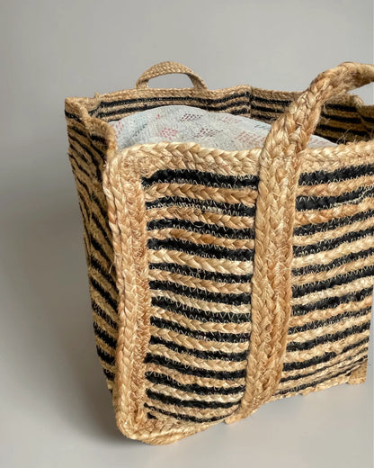 Close up texture of hand braided black and natural jute weave