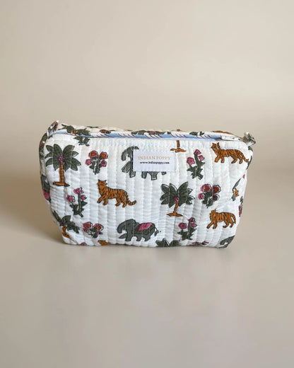 wash bag front view featuring elephant, tigers and palms all hand block printed