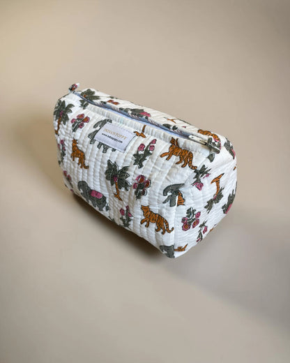 side view of zip closing toiletry bag with water resistant lining
